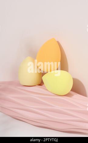 Oval new egg-shaped sponges for cosmetics and foundation Stock Photo