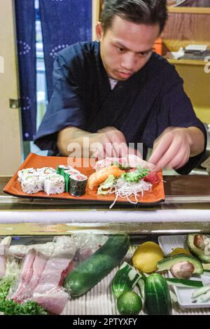 Miami Beach Florida,Yoko's Japanese,restaurant restaurants food dining eating out cafe cafes bistro,chef prepares meal,visitors travel traveling tour Stock Photo