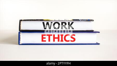 Work ethics symbol. Concept words Work ethics on beautiful books. Beautiful white table white background. Business and Work ethics concept. Copy space Stock Photo