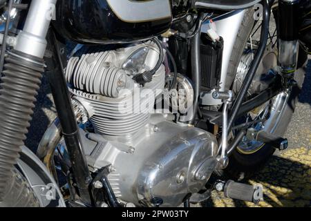 Antique motorcycle engine close up detail background Stock Photo