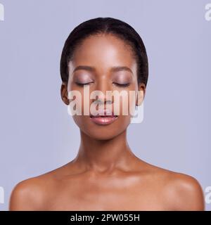 Perfect skin can be yours. Head and shoulders studio shot of a beautiful african american model Stock Photo