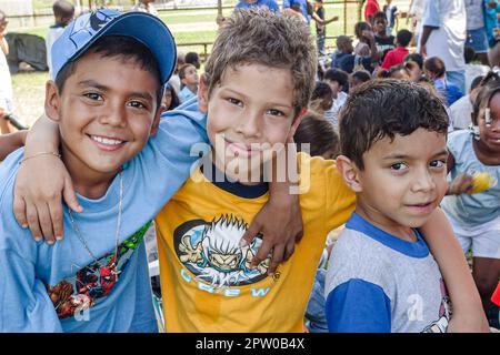 Miami Florida,Frederick Douglass Elementary School,inner city student students Hispanic,boy boys male friends, Stock Photo