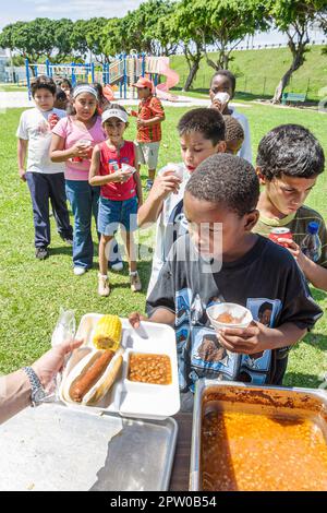 Miami Florida,Frederick Douglass Elementary School campus primary,inner city school day before summer vacation starts class picnic,student students li Stock Photo