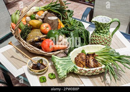 Miami Florida,Kendall Jamaican ethnic traditional foods,Bird of Paradise basket tomatoes green pepper onion,Jamaica, Stock Photo