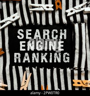 Hand writing sign Search Engine Ranking, Conceptual photo Rank at which site appears in the search engine query Stock Photo