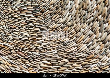 Close-up of strung pebbles Stock Photo