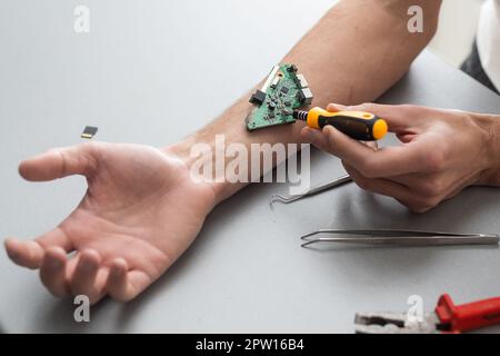 Hand with implantation of micro chip. X-Ray view close-up. Chipization of people, control population Stock Photo