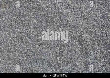 Texture of rough concrete wall with embossed texture. Smooth gray surface Stock Photo