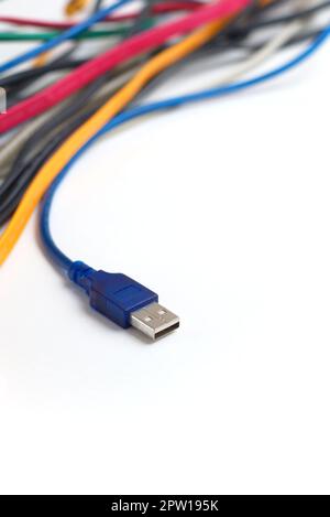 Data transfer computer connector with tangled cables on white background. Tech support, network infrastructure concept. Stock Photo