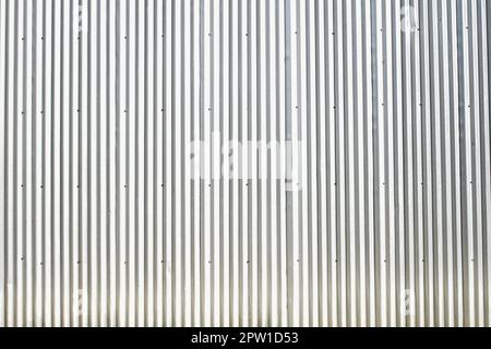 Bright silver corrugated metal sheet background Stock Photo