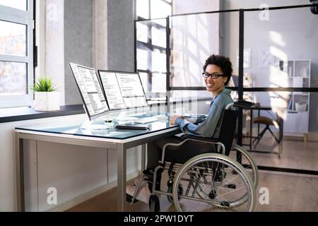 African American Woman Programmer. Girl Coding On Computer Stock Photo