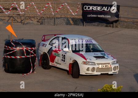 Stuart Cadman R Stuart Cadman and Mike Withers in their 1996 Mitsubishi EVO 4 with the ...