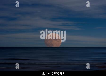 Photo Of The Moon Rising Over The Sea. Illustration. Calm Water With 