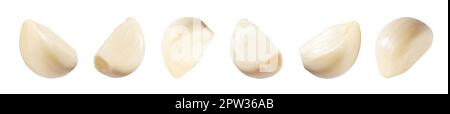 Falling peeled garlic cloves isolated on white background with clipping path. Food and spices objects for design. Spicy and fragrant seasoning concept Stock Photo