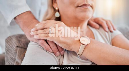 Mature couple, holding hands and support in depression, mental health and anxiety psychology therapy in marriage counseling. Zoom, middle aged man and Stock Photo