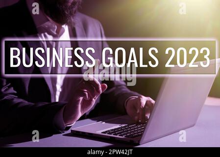 Sign displaying Business Goals 2023, Word for Advanced Capabilities Timely Expectations Goals Stock Photo