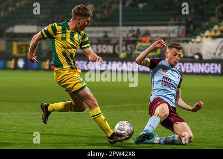 Den Haag, Netherlands. 28th Apr, 2023. DEN HAAG, NETHERLANDS - APRIL 28: Sacha Komljenovic of ADO Den Haag battles for the ball with Flor van den Eyden of Helmond Sport during the Dutch Keukenkampioendivisie match between ADO Den Haag and Helmond Sport at Bingoal Stadion on April 28, 2023 in Den Haag, Netherlands (Photo by Hans van der Valk/Orange Pictures) Credit: Orange Pics BV/Alamy Live News Stock Photo