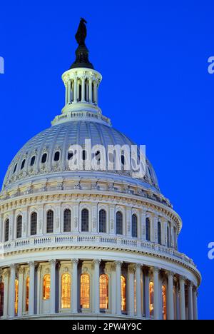 The dome of the United States Capitol, in Washington DC, home to the federal government and politics, is illuminated at night Stock Photo