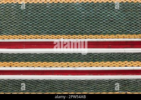 Terracotta tiles are stacked into layers. Popularly made into a Thai temple roof Stock Photo