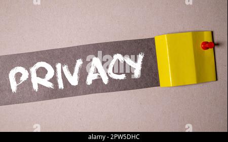 Red color ink rubber stamp in word privacy on white paper background. Stock Photo