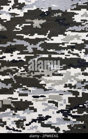 Fabric with texture of Ukrainian military pixeled camouflage. Cloth with camo pattern in grey, brown and green pixel shapes. Official uniform of Ukrai Stock Photo