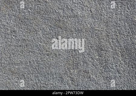 Texture of rough concrete wall with embossed texture. Smooth gray surface Stock Photo