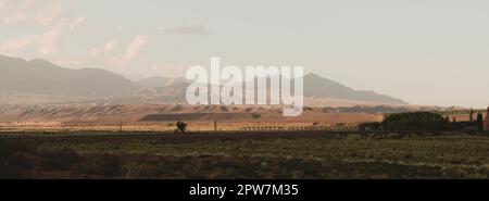 Rolling hills in the arid Uspallata, in Mendoza, Argentina. Wide panoramic shot. Stock Photo