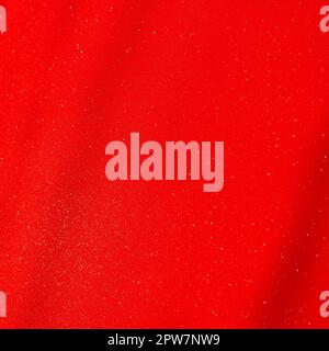 Red background, arched scarlet. Nice holiday color. Background with shimmer, gradient, white dots. Photograph of sparkling colored paper Stock Photo