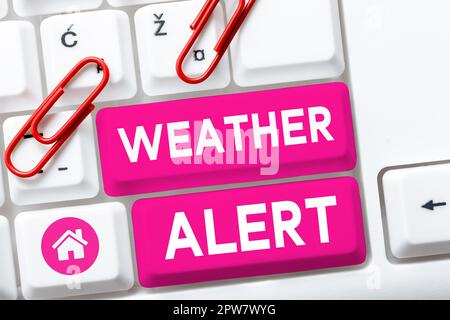 Hand writing sign Weather Alert, Word for urgent warning on the state of the atmosphere at a place and time Stock Photo