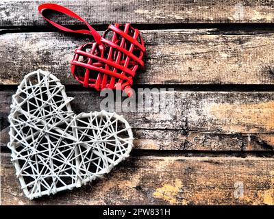 Red heart shaped braided wicker on white background Stock Photo - Alamy