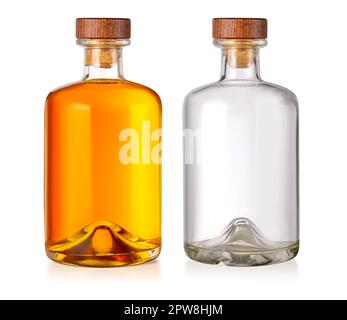 A full bottle of whiskey and empty  isolated on a white background Stock Photo