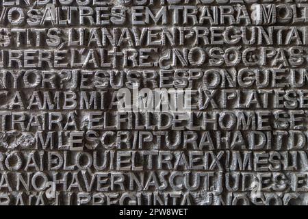 metallic ancient latin letters background texture (illegible inscriptions) Stock Photo