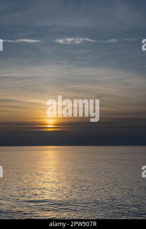 Streak of sunlight going across the Bristol channel Stock Photo