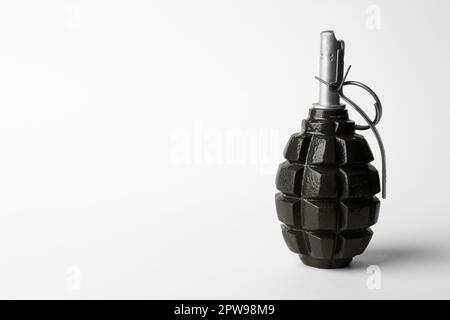 Hand grenade on white background. Space for text Stock Photo
