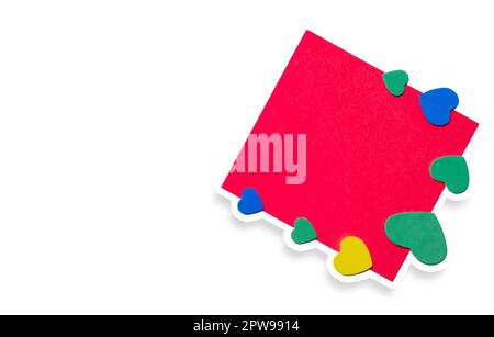 Blank paper note and hearts on white paper background. Valentine's Day. Stock Photo