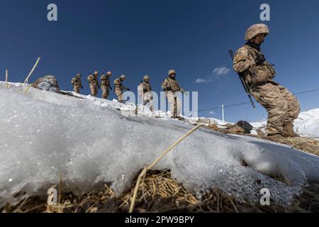 (230429) --  KHUNJERAB, April 29, 2023 (Xinhua) -- Soldiers patrol in Khunjerab, northwest China's Xinjiang Uygur Autonomous Region, April 13, 2023. Gao Guanghui, a recruit who had just joined the army for 7 months, was shocked when he walked into the honor room of the border defense regiment in Khunjerab, northwest?China's Xinjiang Uygur Autonomous Region.    The regiment is based on the Pamirs, guarding the China-Pakistan border and Khunjerab Port. With an average altitude of 4,700 meters, the place is a 'forbidden zone' for many people, as the temperature here can drop to as low as minus 40 Stock Photo