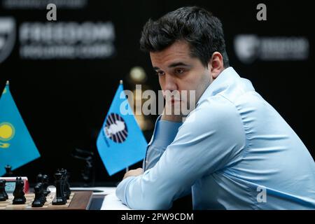 China's Ding Liren, left, and Russia's Ian Nepomniachtchi shake hands prior  to their FIDE World Chess Championship in Astana, Kazakhstan, Saturday,  April 29, 2023. Ian Nepomniachtchi and Ding Liren are facing off