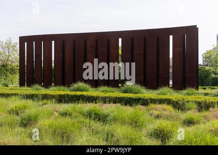 Milan, Italy - april 28 2023 -  the outdoor garden of Pirelli Hangar Bicocca, an exhibition space dedicated to modern and contemporary art, with the s Stock Photo