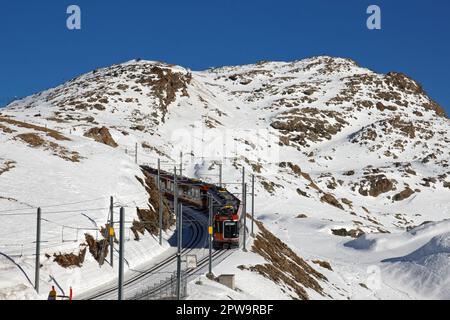 The Gornergrat Bahn coming down from the mountain on its way back to Zermatt Stock Photo