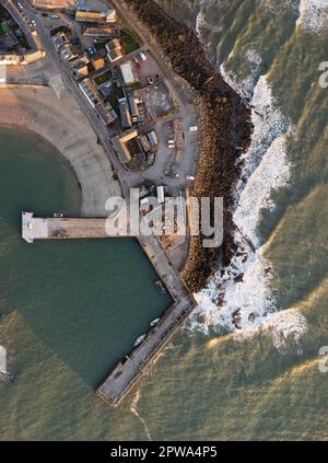 Stonehaven harbour and town at sunrise during the summer Stock Photo