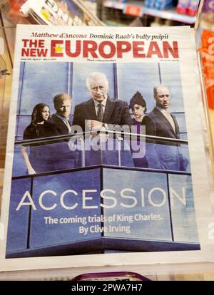 The New European newspaper headline front page 'Accession The coming trials of King Charles' royals King Charles III coronation article April 2023 UK Stock Photo