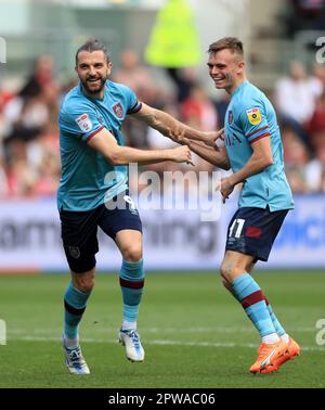 Scott Twine celebrates after scoring for Milton Keynes Dons, to extend ...