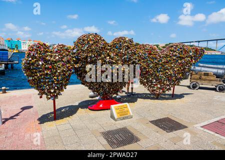 Love locks Williamstad Netherland Antilles Curacao a tourist cruise ship destination in the caribbean Willemstad is the capital city of Curaçao, a Dut Stock Photo