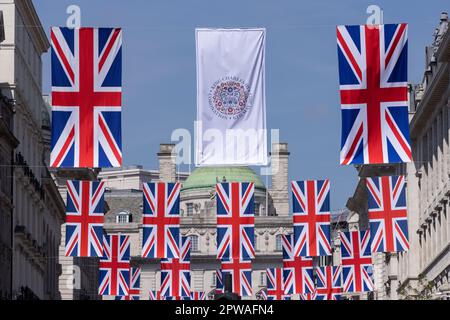 Shirtmaker boutique on Jermyn Street, displays a photograph of King Charles III ahead of the weekends Coronation, London, UK Stock Photo