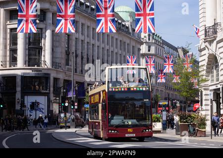 Union Jack flags hang along Regent Street ahead of the King Charles III Coronation on May 6th 2023, London, UK Stock Photo