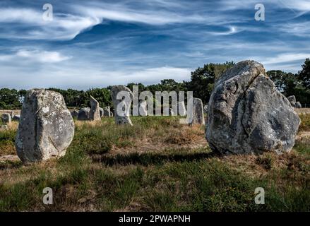 Ancient Stone Field Alignements De Menhir Carnac With Neolithic Megaliths In Brittany, France Stock Photo