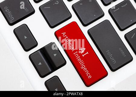 AI - Artificial Intelligence word text on computer keyboard. Auto smart chat in business working technology concept. Stock Photo