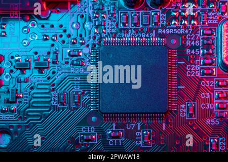 Digital Microprocessor. Computer Controller Circuit Board closeup Main Central Processing Unit Electronic Chips with Data Signal Lane. Stock Photo
