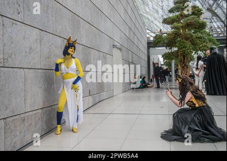 Visitor in cosplay costume poses for photos during the Leipzig Book Fair The Leipzig Book Fair takes place from 27 to 30 April 2023 at the Leipzig exhibition center Neue Messe.  It's annual international book fair  that take place again after 3 years of pandemic break. About 2000 exhibitors from 40 countries present their new books. The part of the fair is the Manga Comic Convention. Stock Photo