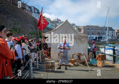 Brixham, UK. 29th Apr, 2023. Thousands of people, most dressed as pirates, enjoy the Brixham Pirate Festival on the Devon coast. Credit: Thomas Faull/Alamy Live News Stock Photo